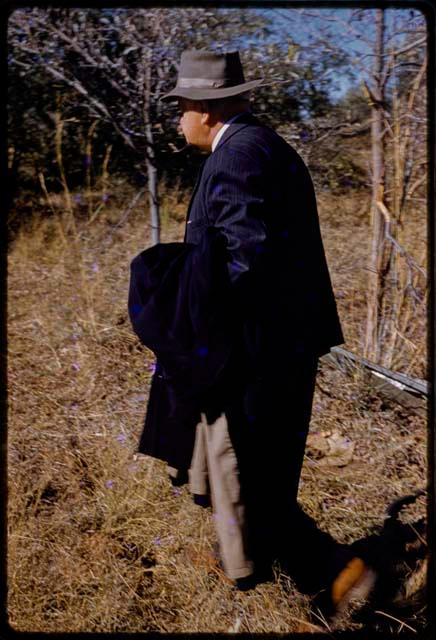 Professor L. F. Maingard walking, seen from behind