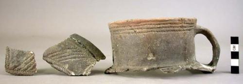 Corded pottery pitcher (rim and 4 sherds)