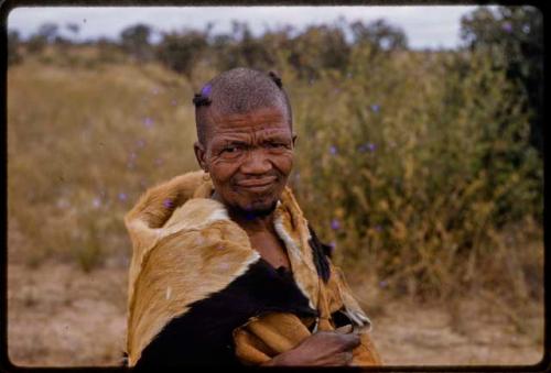 Man wearing an animal skin, close-up