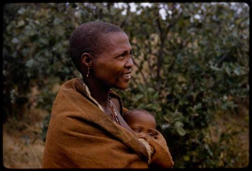 Woman holding a baby, close-up