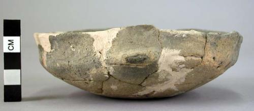 Pottery bowl-cup, profilated, originally with over-looped handle