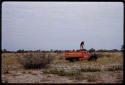 John Marshall on top of expedition truck filming