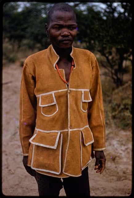 Man in tailored skin coat