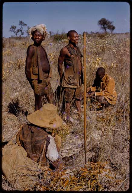 Group of men in a grassy field