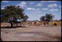 Huts and bare sandy ground