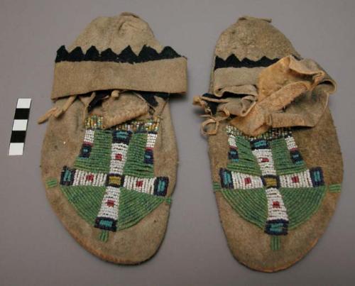 Pair of Plains moccasins, possibly Sioux. Hard soles w/ leather uppers