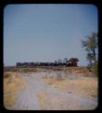 View of kraal and road along the Okavango River