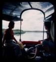 Elizabeth Marshall Thomas and Lorna Marshall on a boat on the Okavango River