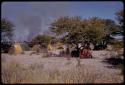 Expedition camp, smoke from a fire in the sky