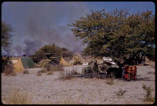 Expedition camp, smoke from a fire in the sky