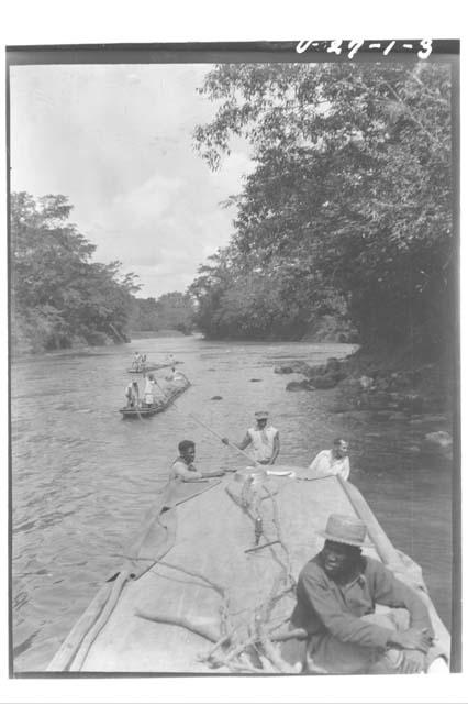 Boats moving down river