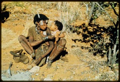 Children, Eating: !Ghia offering a bite of food to her baby