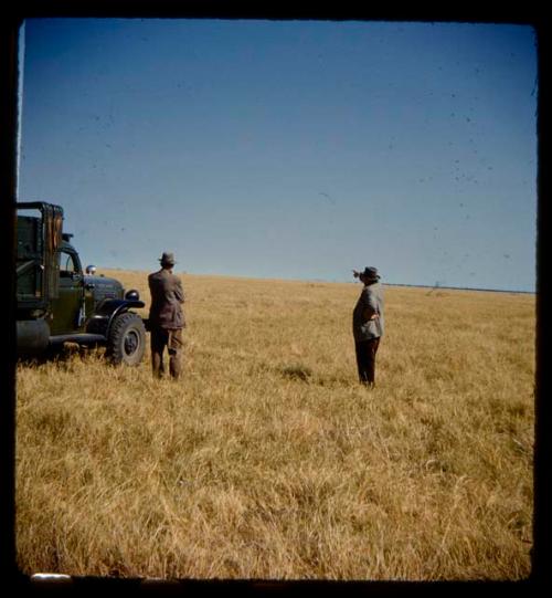 Senator van Zyl and Mr. Mahan standing next to an expedition truck