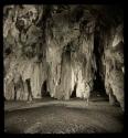 Person standing inside Gcwihaba ("Drotsky's cave")