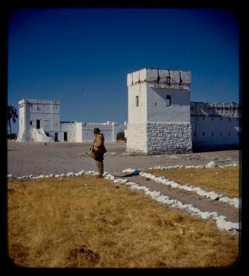 Merl La Voy standing in front of the German fort at Namutoni