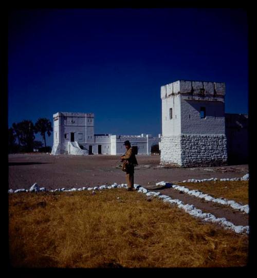 Merl La Voy standing in front of the German fort at Namutoni