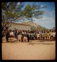 Large group of children at a school being inspected by Colonel Hoogenhout and Mr. Nesser