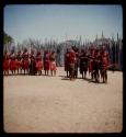 Nehemiah standing with his wives in his kraal