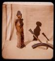 Figurine of a woman and a pipe made from an animal horn