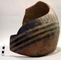 Large pottery jar, broken into 35 potsherds