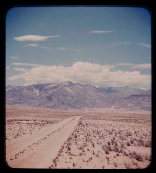 Road, with mountains in the background