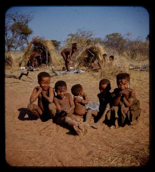 Group of children sitting, including Tsamgao (≠Toma's son), N!aishi (son of //Kushay and /Qui), "Little ≠Gao" (//Kushay's baby), /Gaishay (≠Toma's son) and N!ai