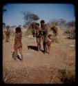 N!aishi (//Kushay's son), Tsamgao, /Gishay (younger son of "Old Gau") and "Little ≠Gao" dancing