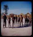 Group of men and boys standing with Robert Dyson