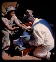 Person having their face cast made by Eric Williams and another expedition member