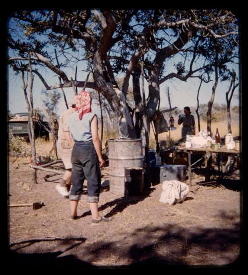 Elizabeth Marshall Thomas, Lorna Marshall and Eric Williams standing in the expedition camp