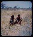 "Young Men": Two boys sitting [streaked]