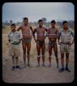 "Young Men": Five young men standing including Ngani [streaked]