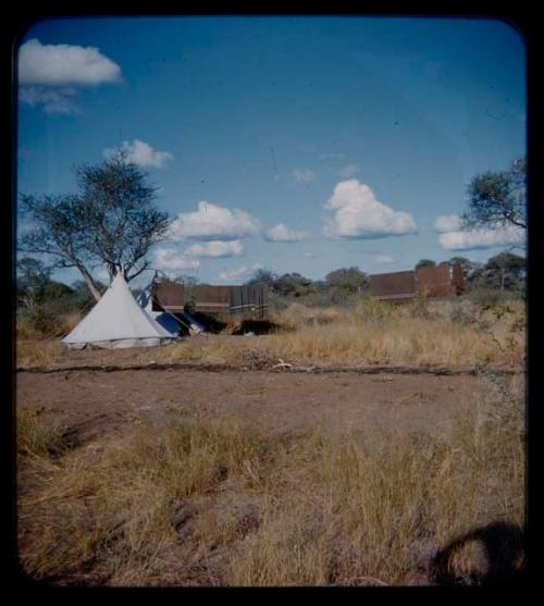 Expedition: Two squad tents at the expedition camp, with blankets hanging on a line