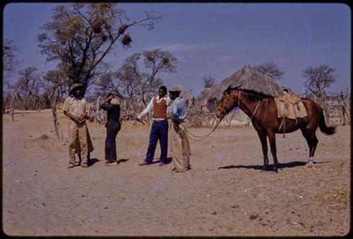 Kernel Ledimo greeting friends and relatives