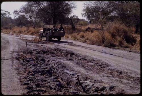 Expedition Jeep driving on a road