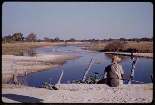 Man fishing at a river