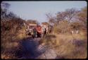 Expedition red Dodge stuck on the side of a road