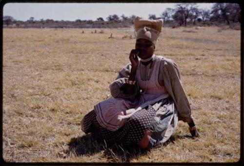 Woman sitting in a field