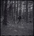 Lorna Marshall and another woman standing in a wooded area