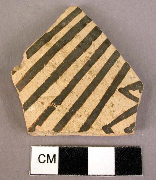 Sherd of painted pottery - goemetric design.