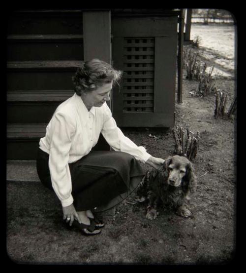 Lorna Marshall petting a dog