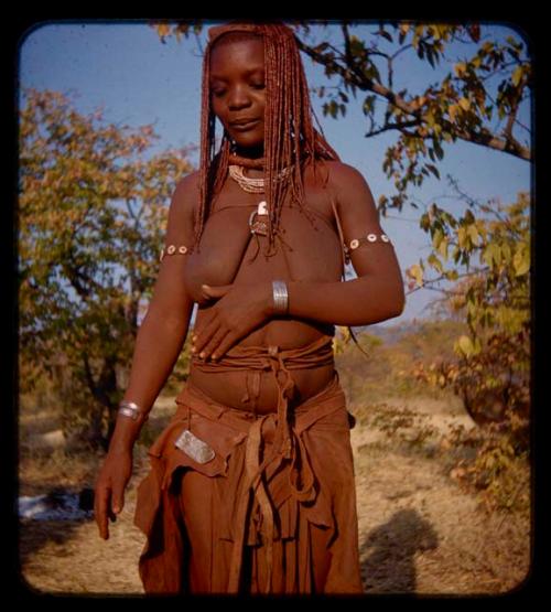 Woman standing, close-up