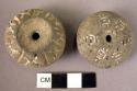 2 pottery spindle whorl with incised and colored designs