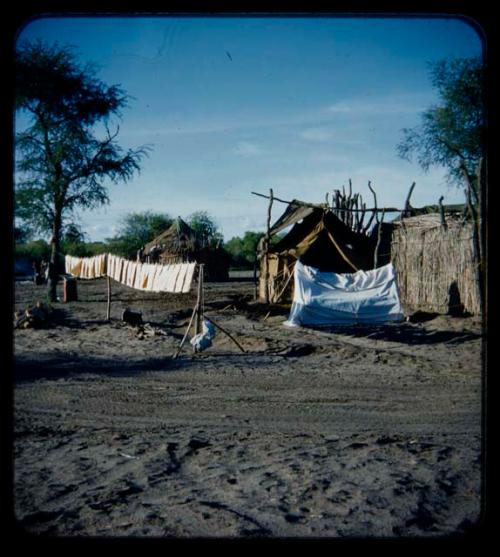 Expedition: Expedition campsite, showing tents, huts, and cloths hanging on a line