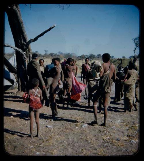 Expedition: Group of people standing at the campsite