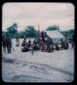 Expedition: Group of people, including Lorna Marshall, gathered in front of a tent