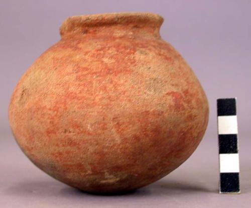 Small pottery jar with constricted neck, chipped lip - Red ware