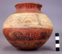 Pottery jar, base red, upper zone white with black ornamentation