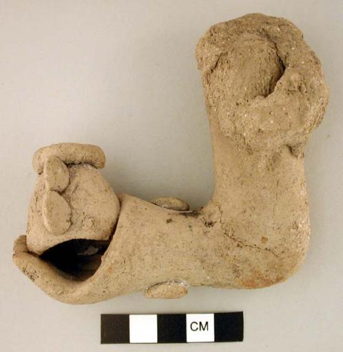 Arm and hand of terra-cotta effigy (human)