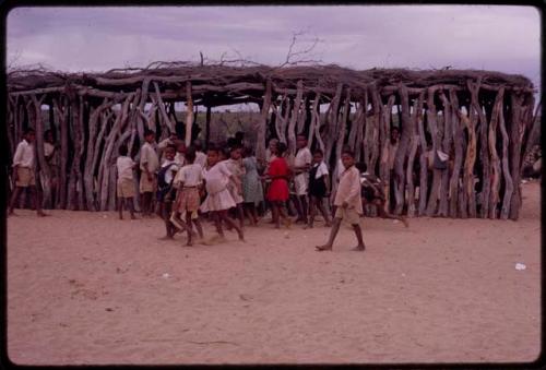 Students entering a tanning shed used as an auxiliary classroom by a school